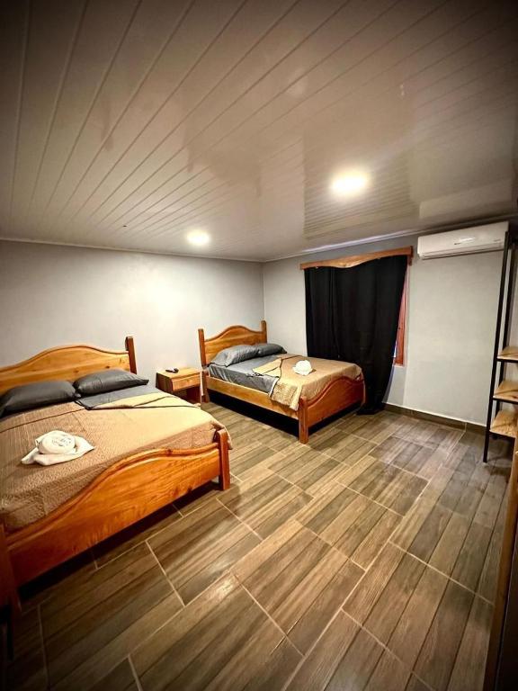 Postel nebo postele na pokoji v ubytování Blasina Beer Hostel