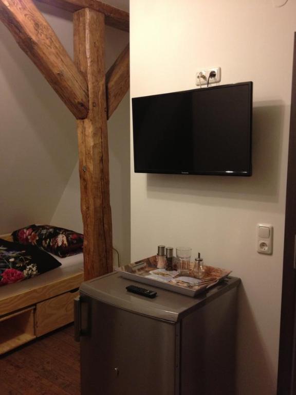 TV a/nebo společenská místnost v ubytování Old Town Guesthouse Erlangen
