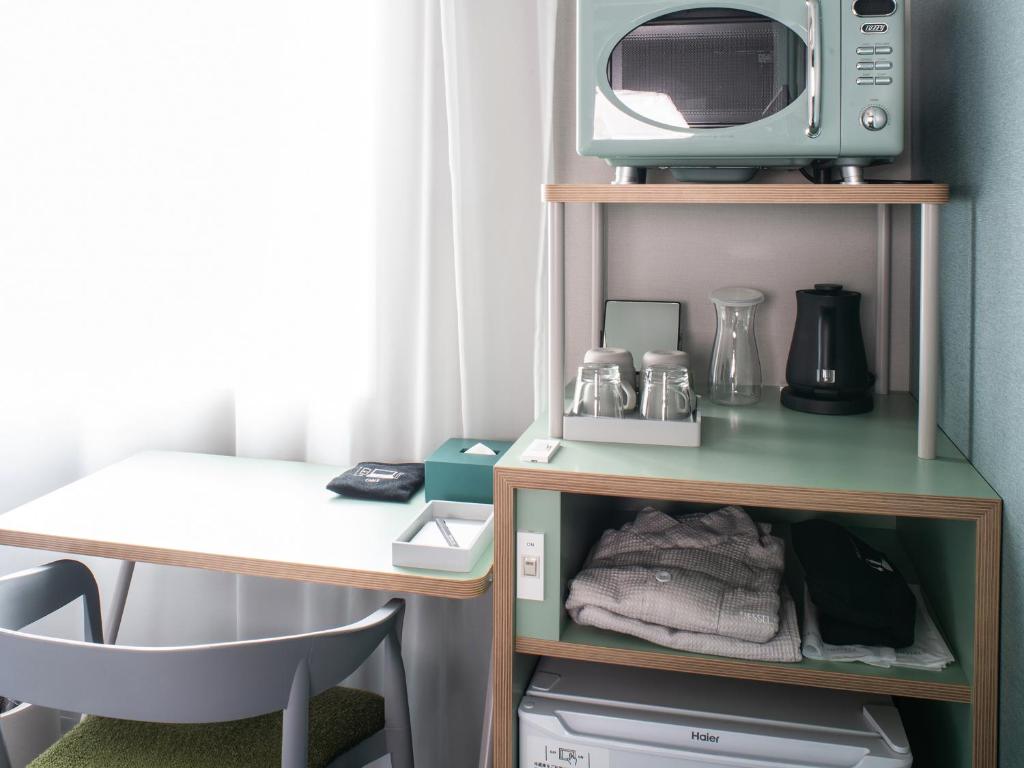 Příslušenství pro přípravu čaje a kávy v ubytování Vessel Inn Takadanobaba Station
