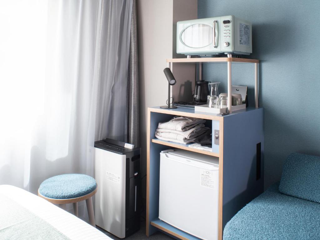 Kuchyň nebo kuchyňský kout v ubytování Vessel Inn Takadanobaba Station