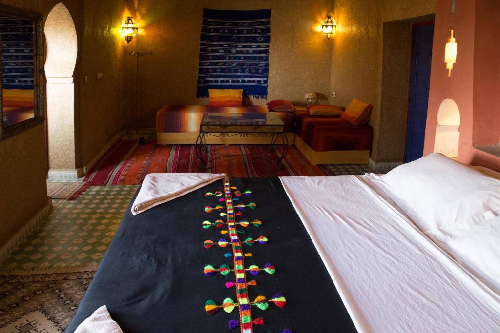 Postel nebo postele na pokoji v ubytování Kasbah Hotel Panorama