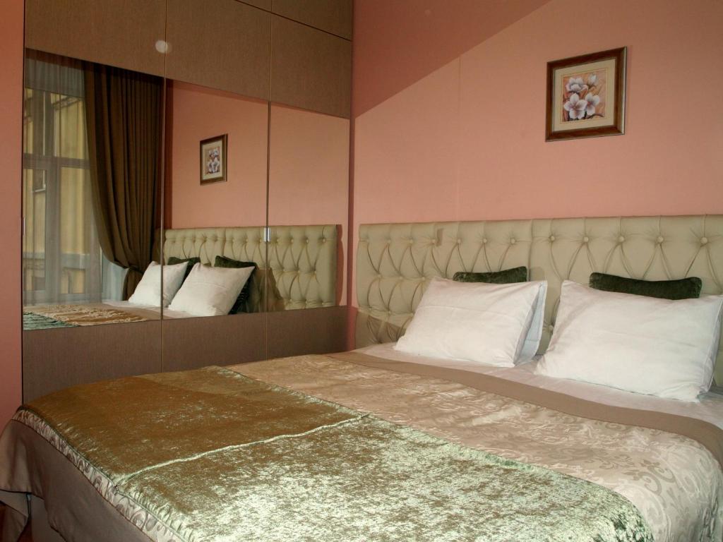 Postel nebo postele na pokoji v ubytování Hotel Lota