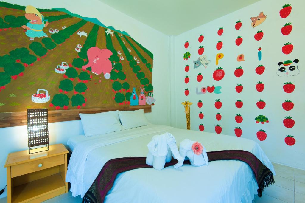 Postel nebo postele na pokoji v ubytování Baan Chokdee Pai Resort