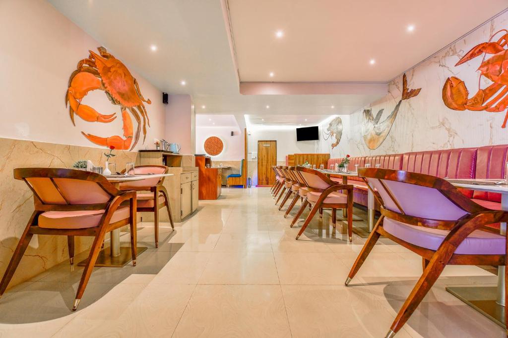 TV a/nebo společenská místnost v ubytování FabHotel Ashirwad - Nr Mall De Goa, Porvorim