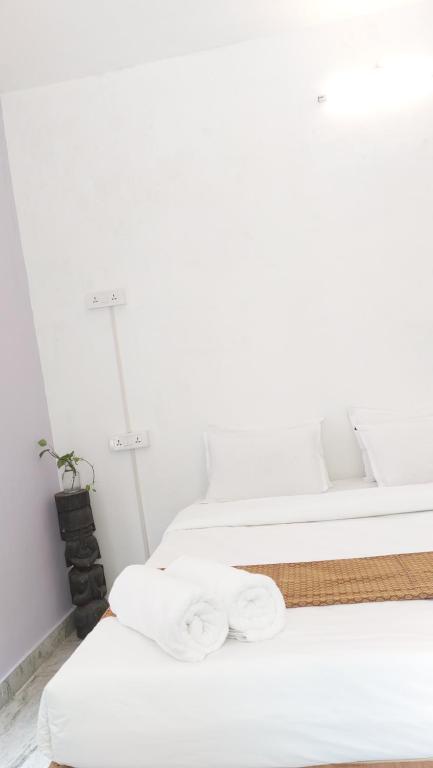Uma cama ou camas num quarto em 26 LaPorte