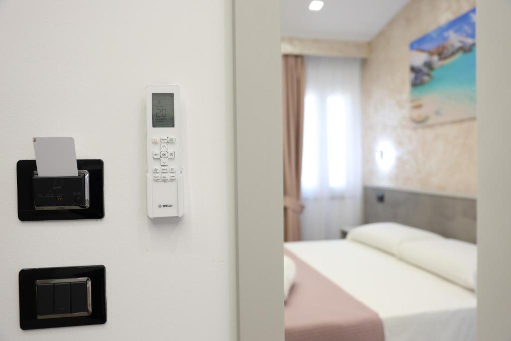 Postel nebo postele na pokoji v ubytování B&B Sunlight Tropea