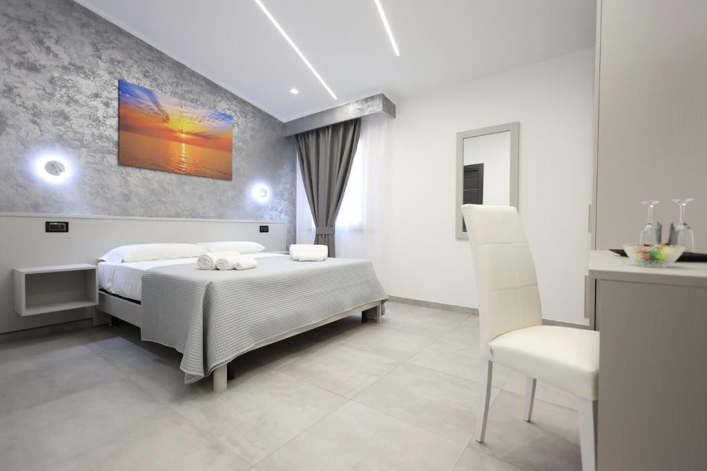 Postel nebo postele na pokoji v ubytování B&B Sunlight Tropea