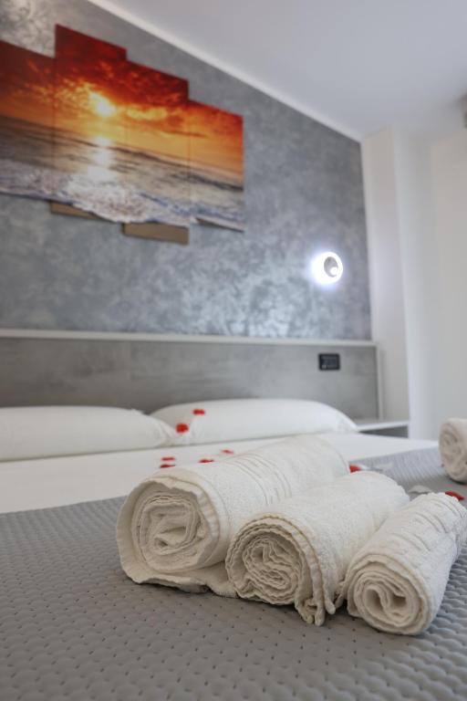 Postel nebo postele na pokoji v ubytování B&B Sunlight Tropea