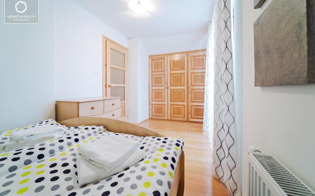 Posteľ alebo postele v izbe v ubytovaní Wonder Home - Apartamenty z balkonami blisko centrum Karpacza