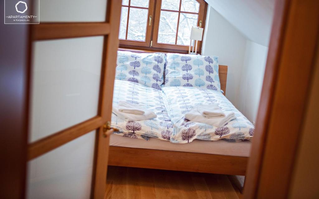 Posteľ alebo postele v izbe v ubytovaní Wonder Home - Apartamenty z balkonami blisko centrum Karpacza