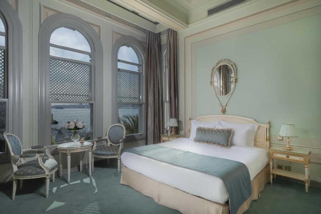 A bed or beds in a room at Bosphorus Palace Hotel