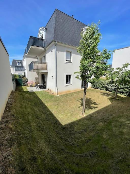 Photo de la galerie de l'établissement Agreable appartement avec jardin au calme, à Hérouville-Saint-Clair