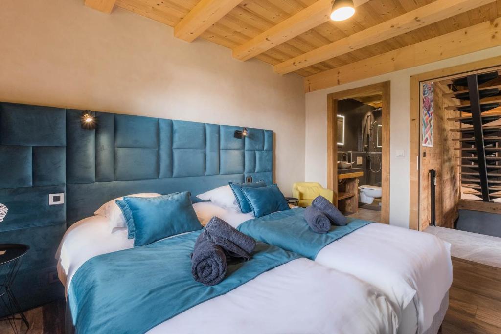 Postel nebo postele na pokoji v ubytování Chalet Familial Spacieux Le Spencer Grand Luxe Châtel