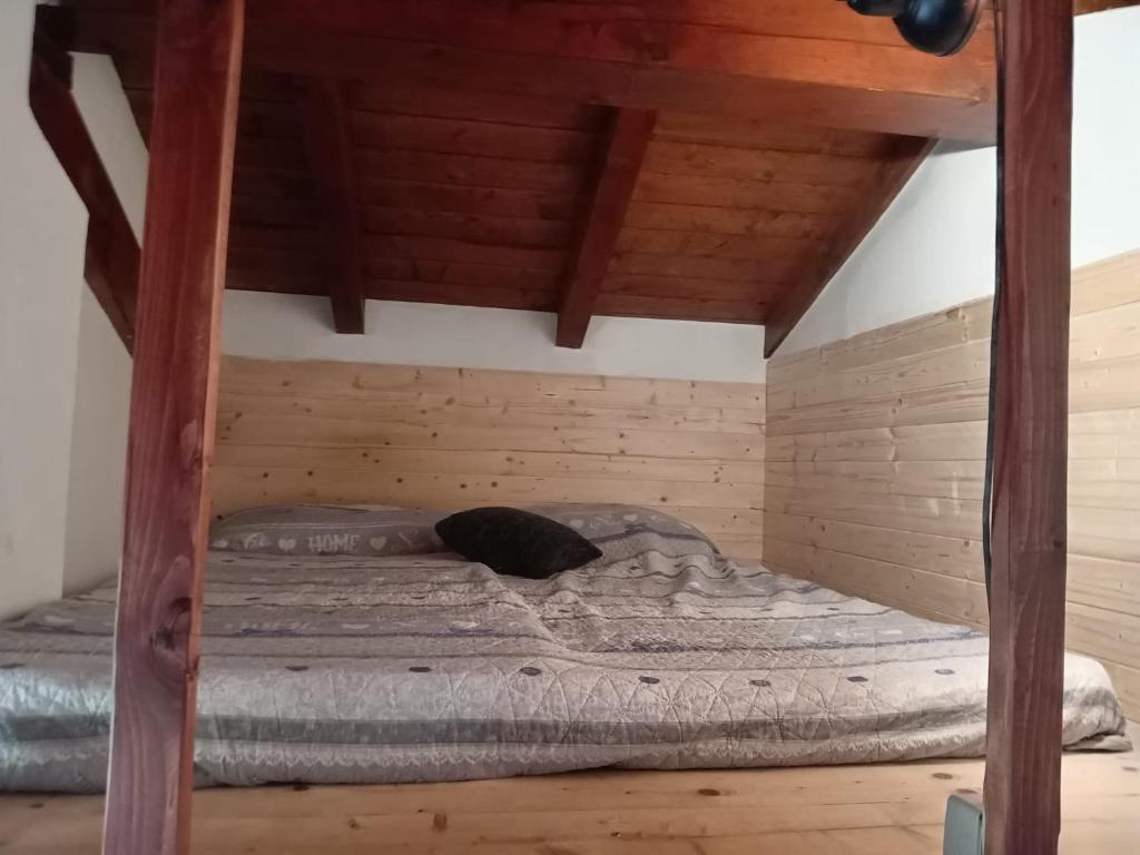 Postel nebo postele na pokoji v ubytování Chalet cima 12 Valle di Sella