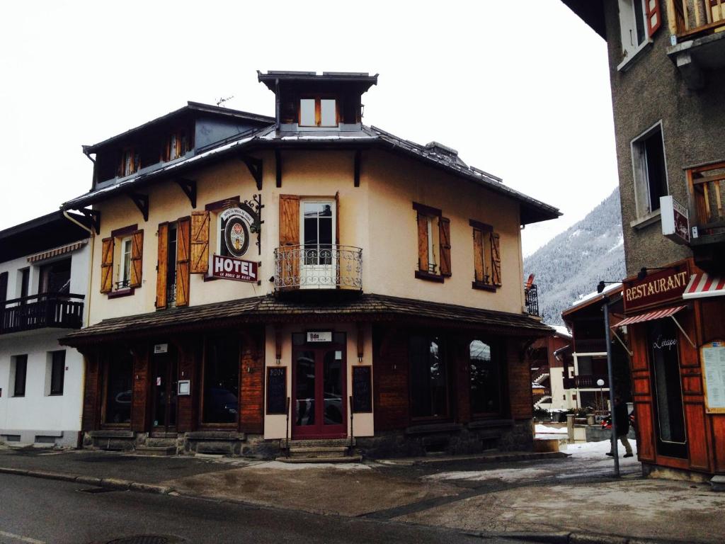 an old building in the middle of a street at BDN Residence in Chamonix