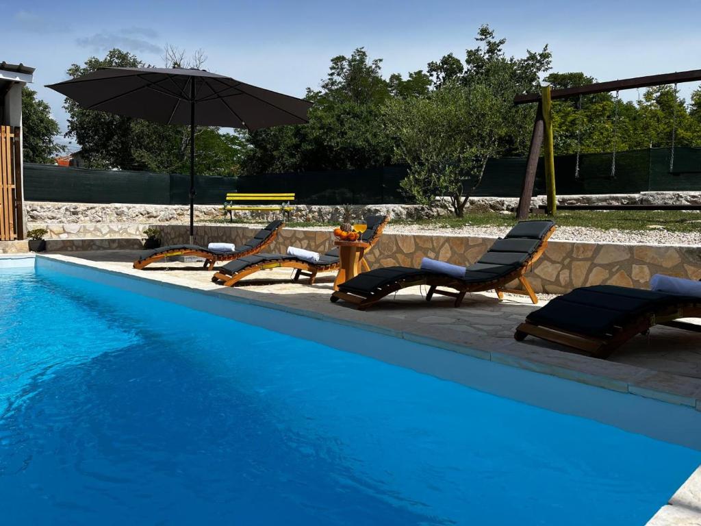 Basen w obiekcie Holiday Home Maslina lub w pobliżu