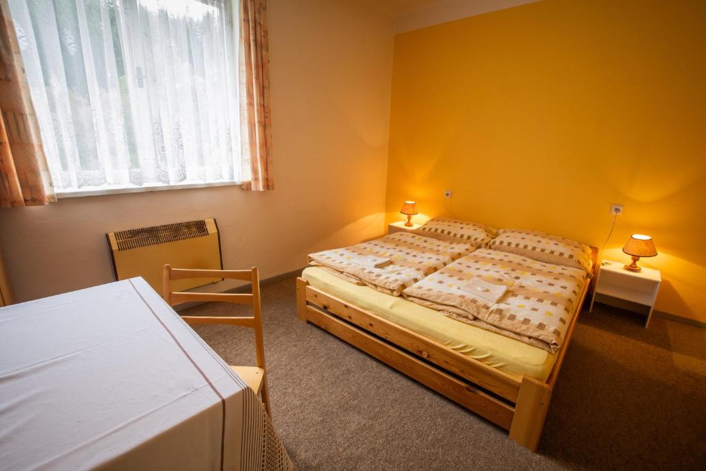 Postel nebo postele na pokoji v ubytování Pension Palla