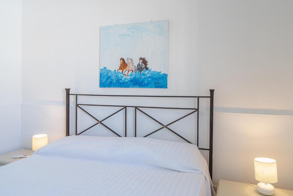 Postel nebo postele na pokoji v ubytování Villa Rosa con accesso sul mare