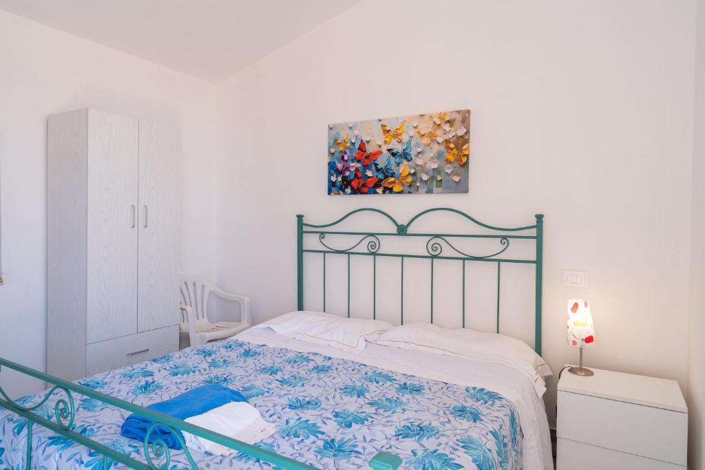 Postel nebo postele na pokoji v ubytování Villa Rosa con accesso sul mare