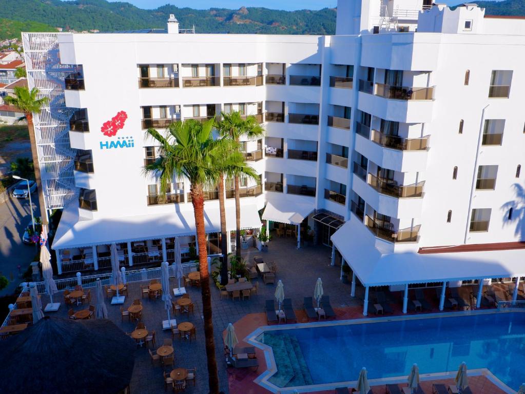 an aerial view of a hotel with a swimming pool at Hawaii Hotel in Marmaris