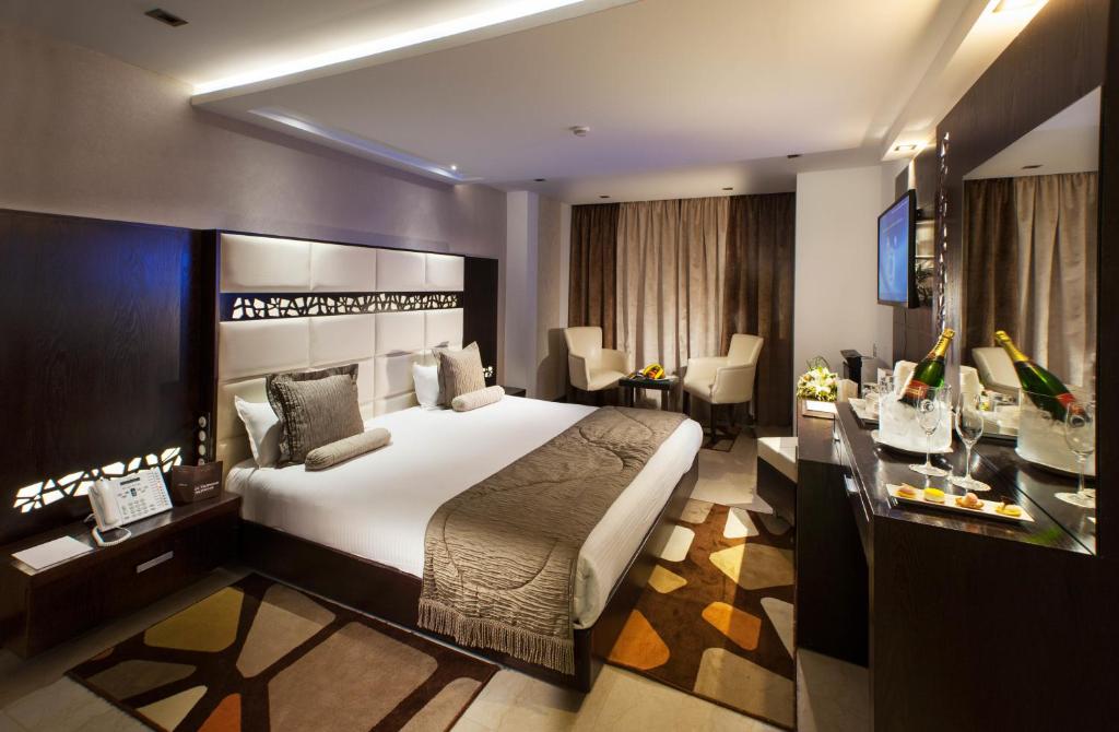 Postel nebo postele na pokoji v ubytování Samarons Hotels