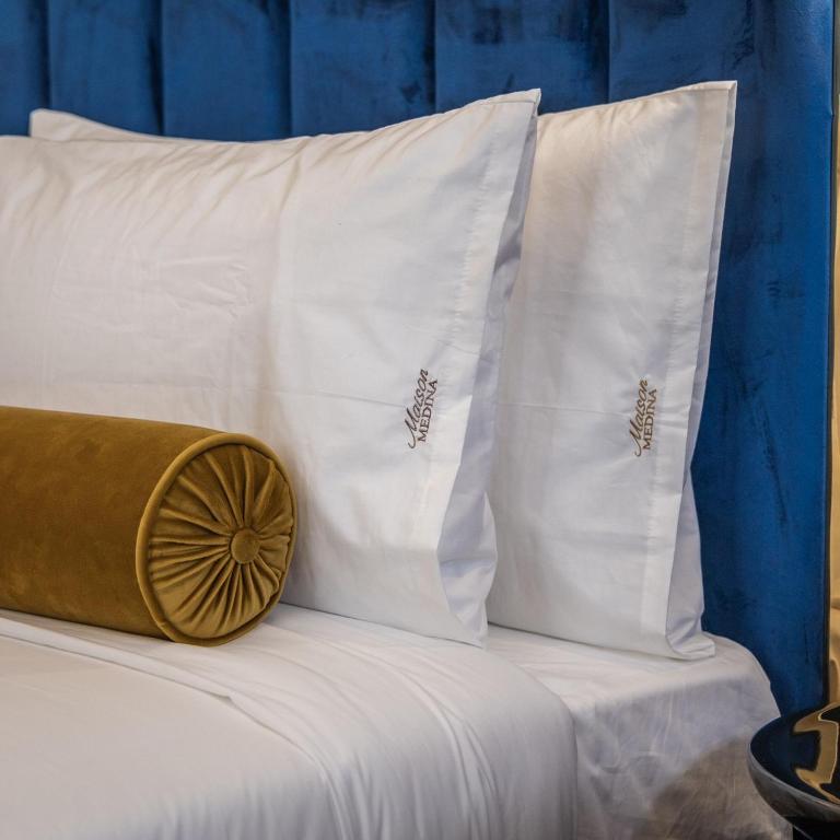 Postel nebo postele na pokoji v ubytování Maison Medina Malta