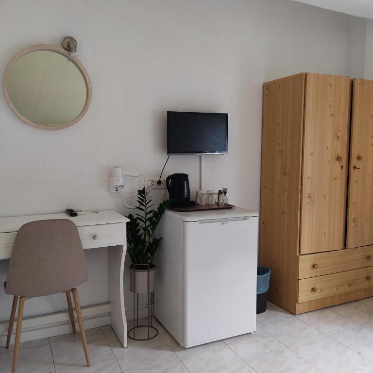 Kuchyň nebo kuchyňský kout v ubytování Anastasia Hotel