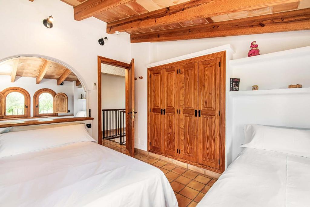 Postel nebo postele na pokoji v ubytování Villa Cal Moliner by Sealand Villas