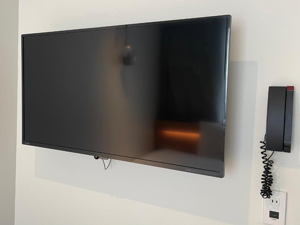 TV a/nebo společenská místnost v ubytování REF Omiya by VESSEL HOTELS