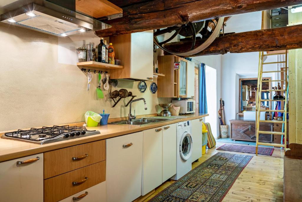 Kuchyň nebo kuchyňský kout v ubytování Loft Tovel