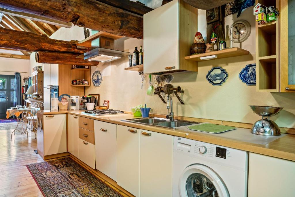 Kuchyň nebo kuchyňský kout v ubytování Loft Tovel