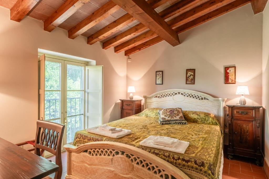 En eller flere senge i et værelse på Villa Nobile Oasi