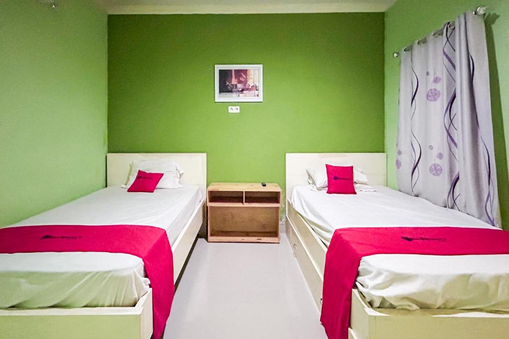 RedDoorz Syariah Near SMA N 6 - Chambre Lits Jumeaux De Luxe