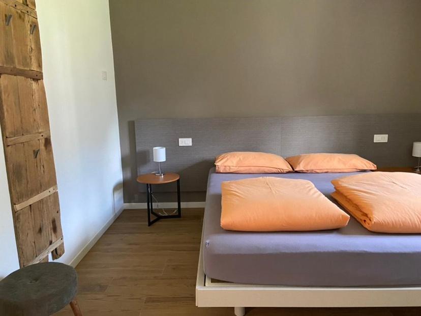Postel nebo postele na pokoji v ubytování CASA VACANZE LA BRENTA
