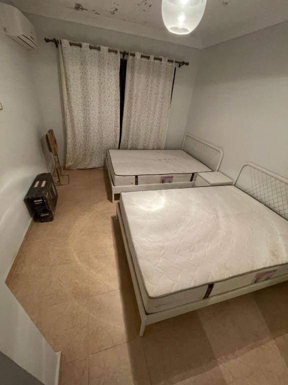Postel nebo postele na pokoji v ubytování New Mattress Challet in blue Bay Asia, Ain Sokhna