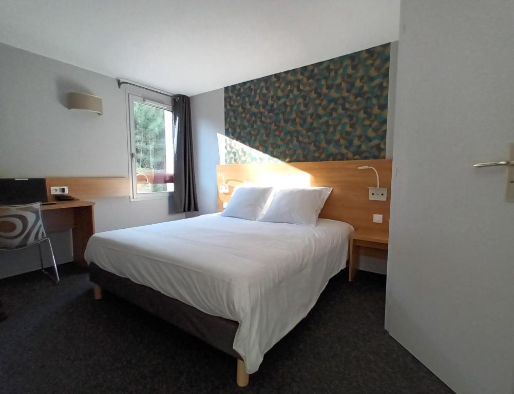 Postel nebo postele na pokoji v ubytování Cit'Hotel Hotel Prime - Montpelier Ouest -Saint Jean de Vedas