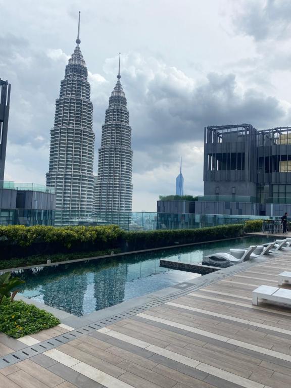 a view of a city with tall buildings at Eastern Suites Star KLcc in Kuala Lumpur