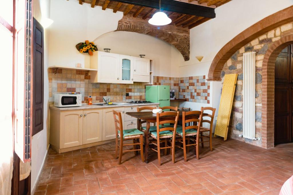 Kuchyň nebo kuchyňský kout v ubytování Appartamento rustico toscano