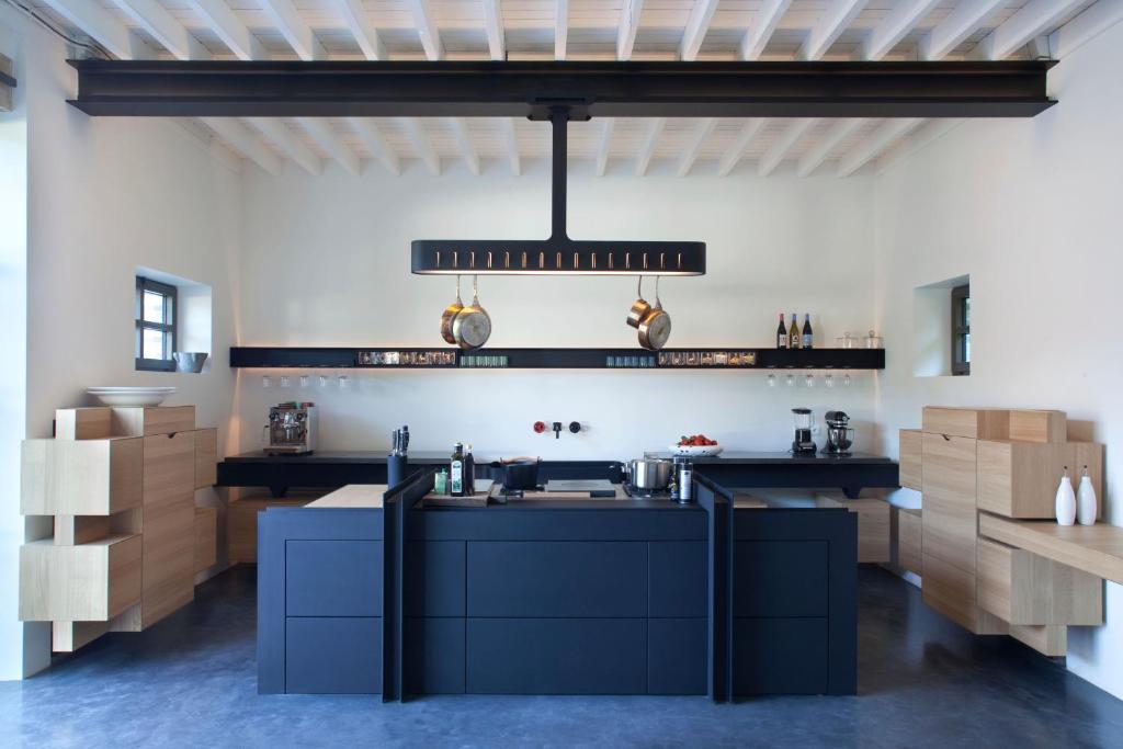 Kuchyň nebo kuchyňský kout v ubytování Chateau De La Resle - Design Hotels