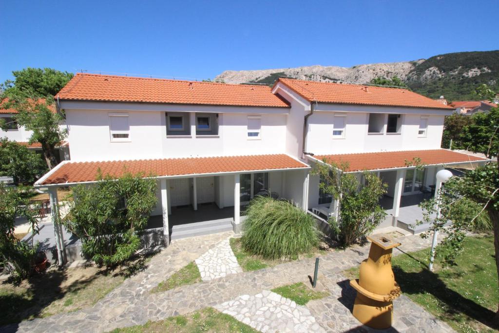 a villa with a view of the house at Villas Corinthia in Baška