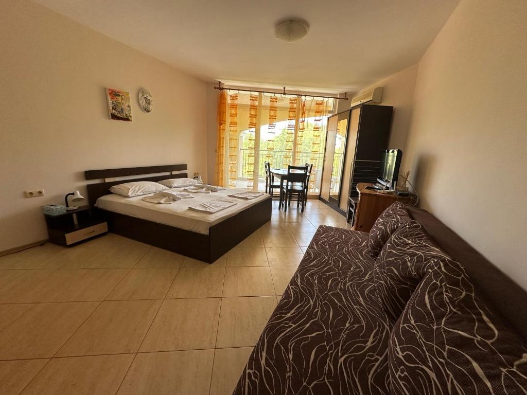 Postel nebo postele na pokoji v ubytování PSB Apartments in Midia Resort Aheloy