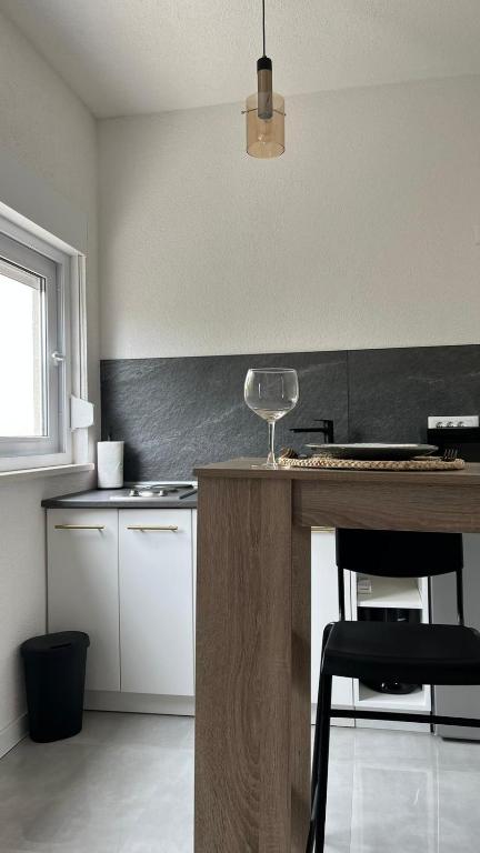 Kuchyňa alebo kuchynka v ubytovaní Apartmani MM