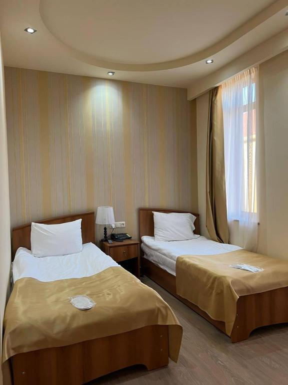 Postel nebo postele na pokoji v ubytování Best Western Bohemian Resort