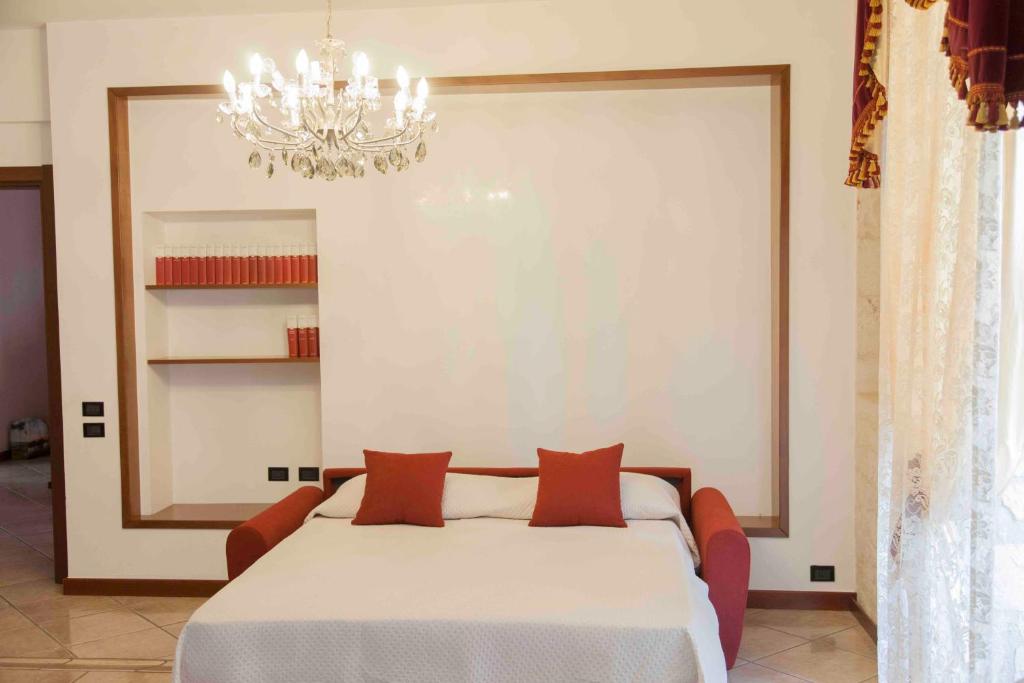 Ένα ή περισσότερα κρεβάτια σε δωμάτιο στο Ferrari 44 - Dimora di Puglia