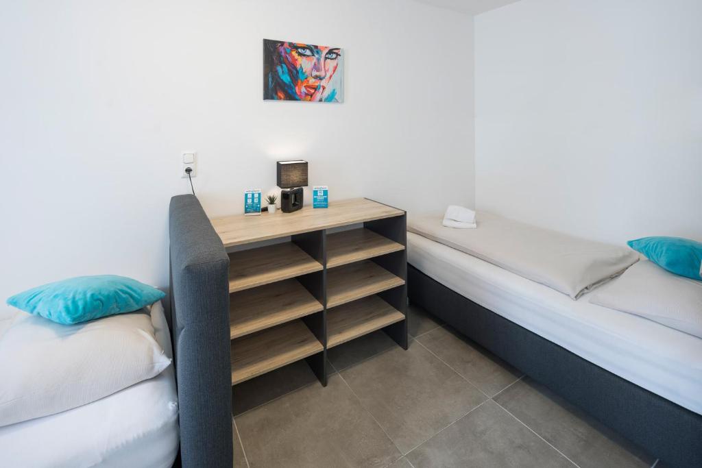 Postel nebo postele na pokoji v ubytování MOTEL24seven