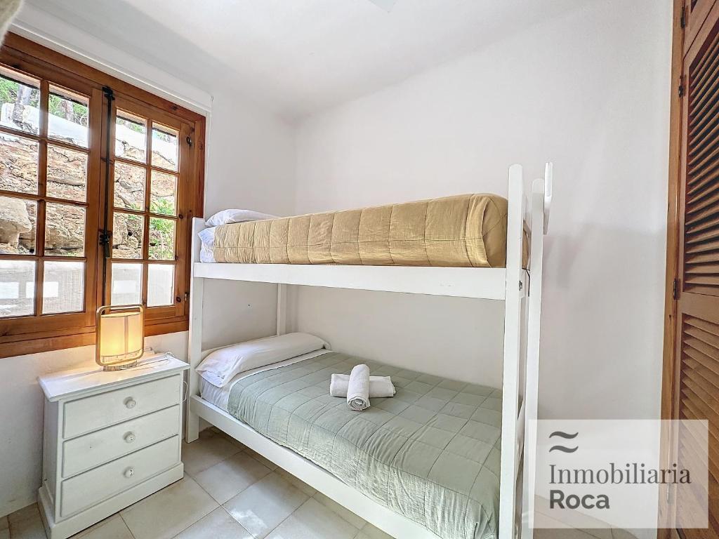 Postel nebo postele na pokoji v ubytování P82. Apartamento marinero con Wifi y aire acondicionado