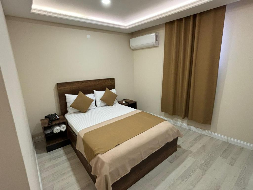 Postel nebo postele na pokoji v ubytování Perla Blanca Hotel