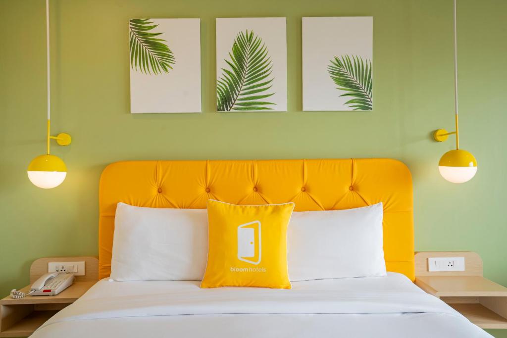 Postel nebo postele na pokoji v ubytování Bloom Hotel - Dona Paula