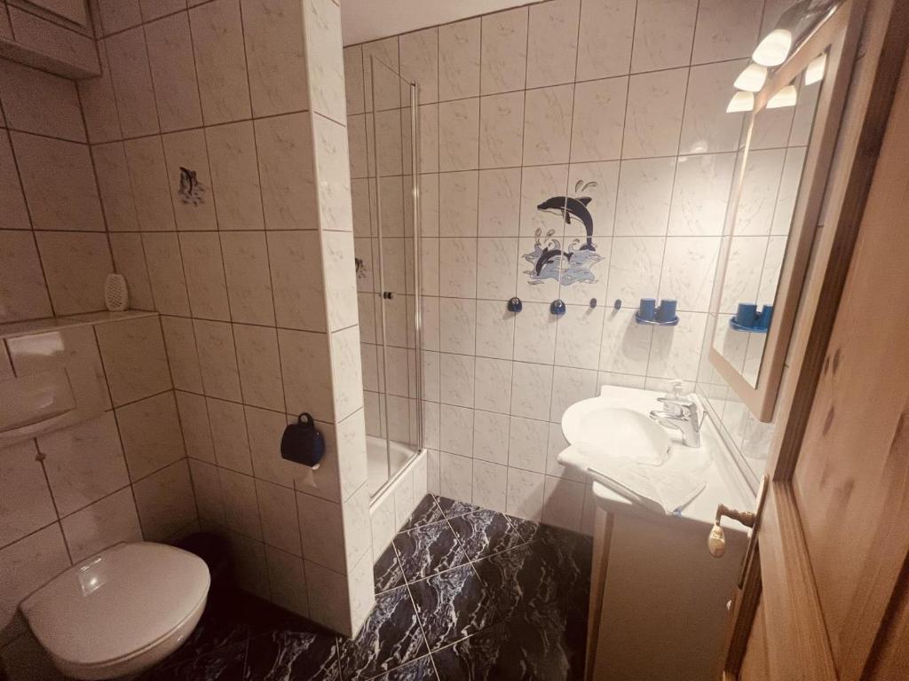 Koupelna v ubytování Ferienwohnung Kimi in Wieck