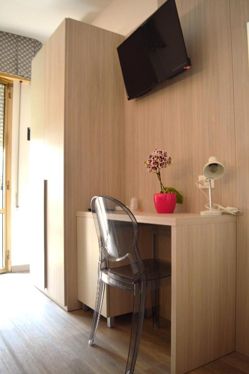 TV a/nebo společenská místnost v ubytování Hotel Le Star